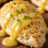 Close-up of Zesty Lemon Chicken Romano with crispy Romano cheese crust and lemon-butter sauce.
