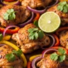 Zesty Sheet Pan Chili Lime Chicken Bake with vibrant chicken, bell peppers, and cilantro